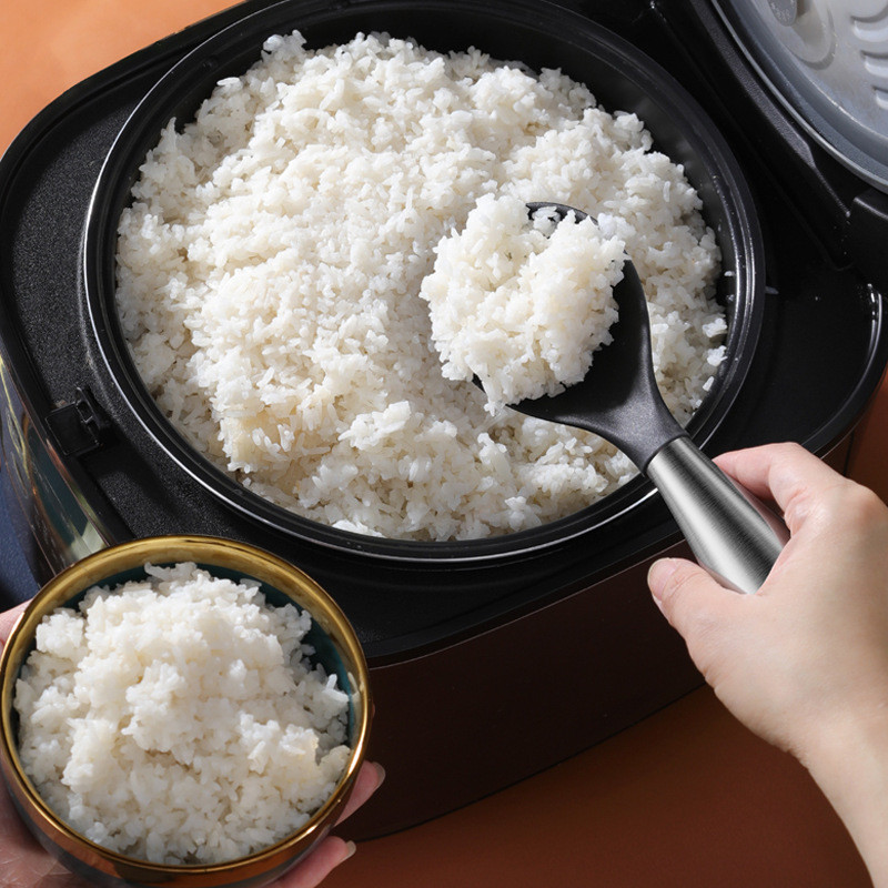 Silikona rīsu karote nerūsējošā tērauda rokturis, nepiedegošs daudzfunkcionāls stāvošs lāpsta telpiskais pārtikas serveris virtuves ēdnīcas sīkrīki