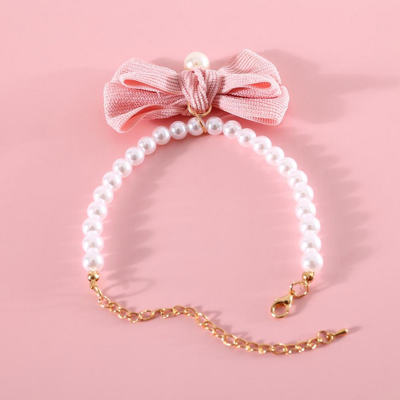 Kényelmes kisállat nyaklánc Elegáns állítható macska kutyanyakörv Könnyű műgyöngy masnival Aranyos kisállat nyak kör kisállat kiegészítő