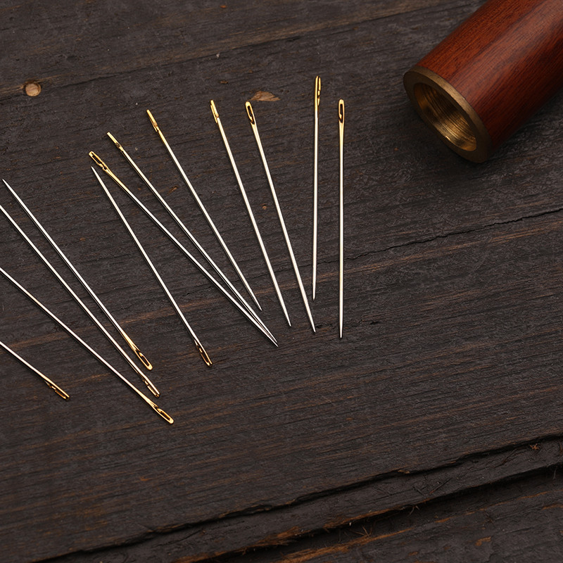 12 tk/komplekti pimenõelad, kuldsaba, mitme suurusega külgmised augud, majapidamises kasutatavad käsitsi õmblusnõelad koos hoiukastiga isetegemiseks