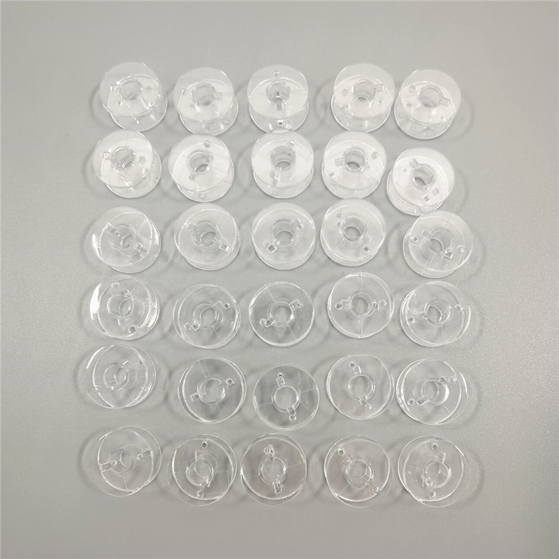 10 gab. Spoles šujmašīnai Plastmasas spoles ar maciņu Bro-Ther šujmašīnas piederumiem