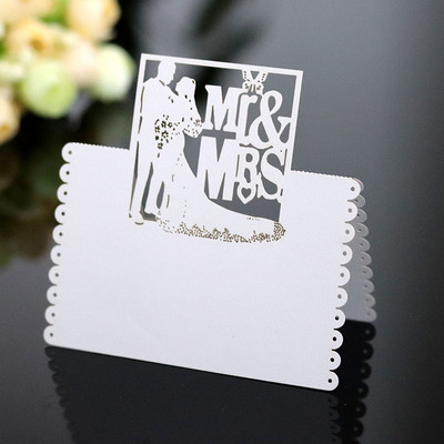 50gab. Lāzergriešanas līgavas un līgavaiņa galda nosaukums Vietas karte MR&MRS viesa ziņojuma iestatīšana Tukša kartīte Kāzu pasākuma ballītes labvēlības piederumi