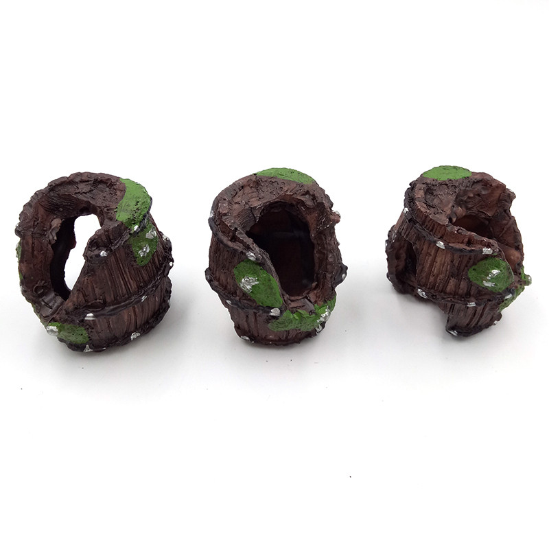 Akvārija dekorēšana Zivju tvertnes dekorēšana Ornamenta imitācija Mucas Zivju māja Garneļu ligzda Sveķu ala Akvārija dekors