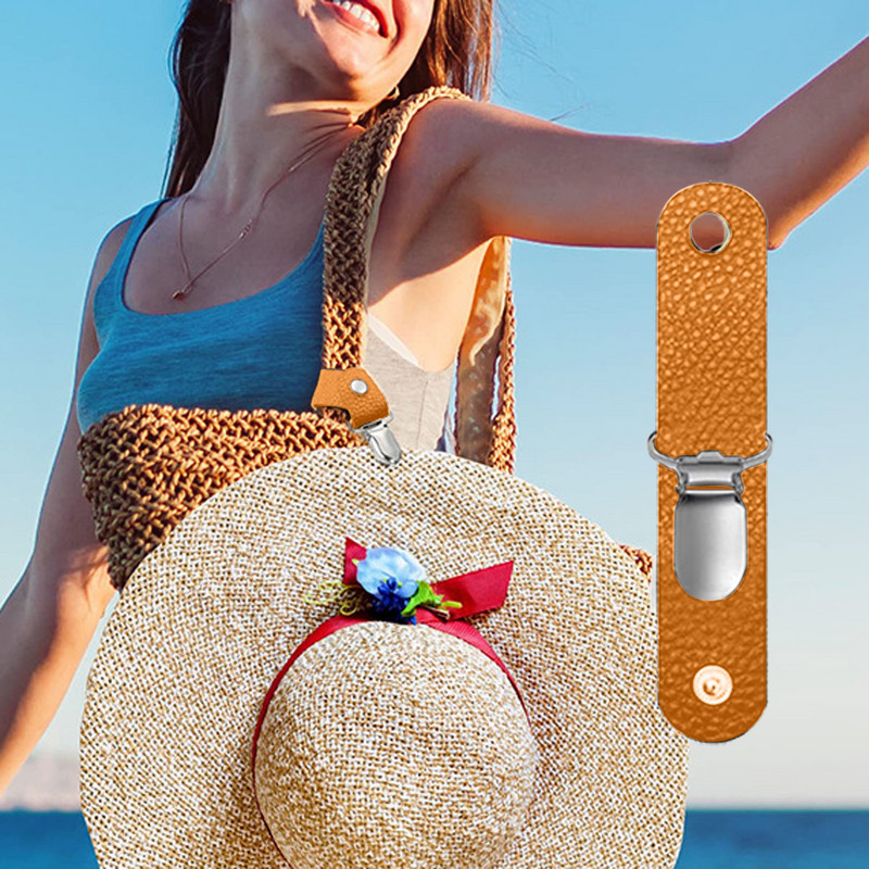 Spalvingas skrybėlių laikiklis, skirtas kelioniniam krepšiui, kuprinei ir kitiems rankinės priedams