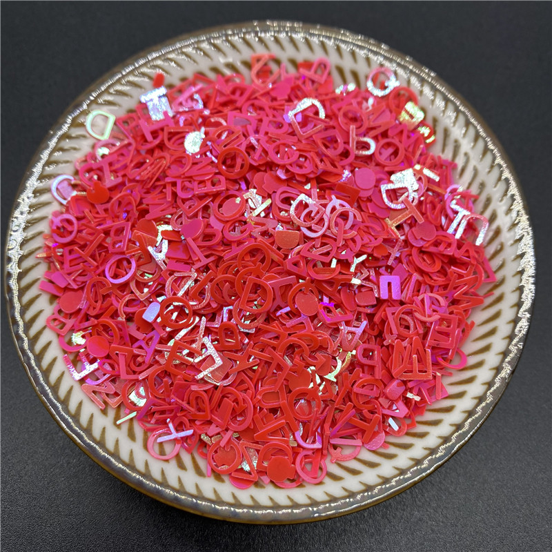 1000db/tétel 6mm-es PVC betű alakú flitterek Paillettes köröm kézműves kiegészítőkhöz barkácsolás medál flitteres körömflitter
