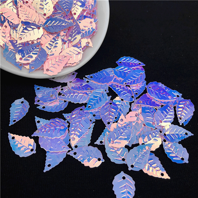 240gab/iepakojumā mirdzošas krāsas 9*16mm lapu forma, vizuļi ar 2 caurumiem un paletes Šūšanas uzlīme uz auduma, apģērba piederumi