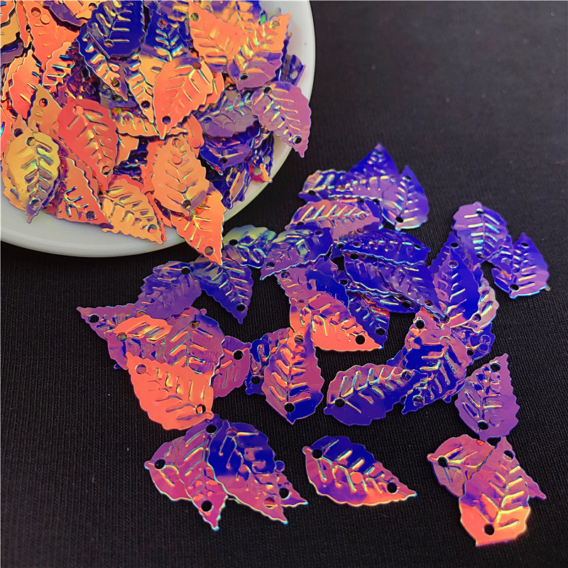 240gab/iepakojumā mirdzošas krāsas 9*16mm lapu forma, vizuļi ar 2 caurumiem un paletes Šūšanas uzlīme uz auduma, apģērba piederumi