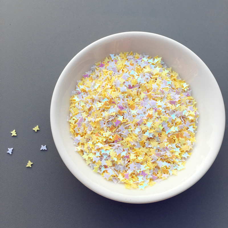 10 g/partija 3 mm mazi tauriņa formas vizuļi, kas paredzēti rokdarbiem, kas paredzēti nagu mākslas manikīram/kāzu dekorēšanai.