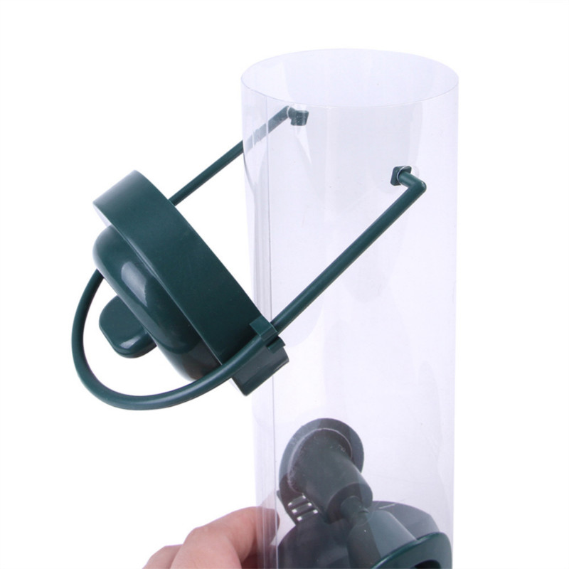 Mājdzīvnieku putnu barotājs Mājdzīvnieku barības dozators āra piekarināms ar vairākiem caurumiem Putnu barotājs Lidojošs dzīvnieks Automātiskās barotavas Kāju barošanas rīki