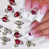 10 tk Punane valge Saturn Planet Küünevõlusid Liblikad Needid Kalliskivid 3D Küünte kaunistused Ehted Kristallküünte Rhinestone maniküür