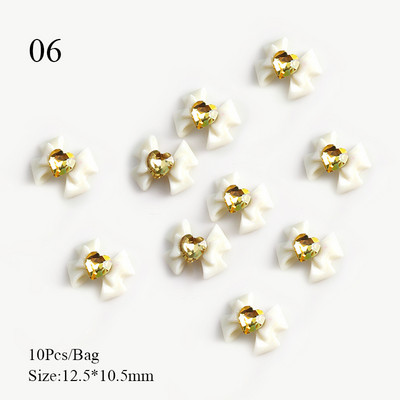 10 tk Punane valge Saturn Planet Küünevõlusid Liblikad Needid Kalliskivid 3D Küünte kaunistused Ehted Kristallküünte Rhinestone maniküür