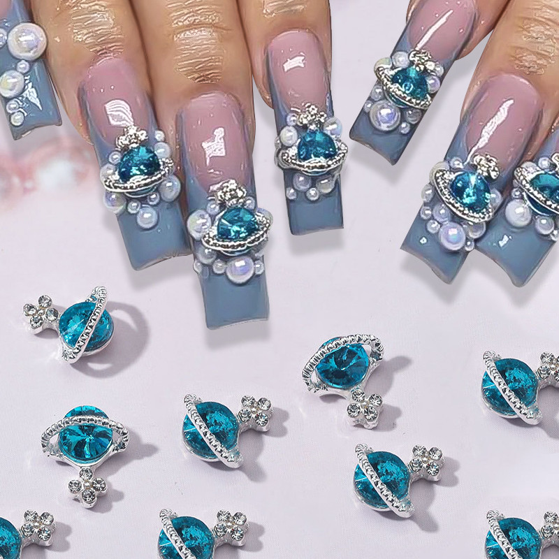 10 tk Punane valge Saturn Planet Küünevõlusid Liblikad Needid Kalliskivid 3D Küünte kaunistused Ehted Kristallküünte Rhinestone maniküür