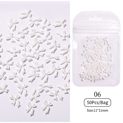 50 tk/kott Glitter kuldne hõbedane vibusõlme 3D küünekunstiga pimedas helendav ornament must valge südamega kivist küünte aksessuaarid