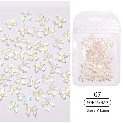 50 tk/kott Glitter kuldne hõbedane vibusõlme 3D küünekunstiga pimedas helendav ornament must valge südamega kivist küünte aksessuaarid