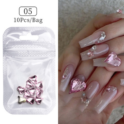 50 tk/kott Glitter kuldne hõbedane vibusõlme 3D küünekunstiga pimedas helendav ornament must valge südamega kivist küünte aksessuaarid