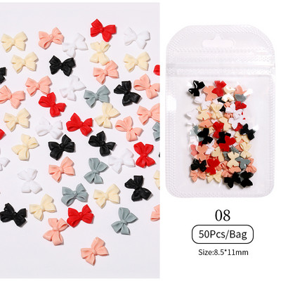 50 tk/kott Glitter kuldne hõbedane vibusõlme 3D küünekunstiga pimedas helendav ornament must valge südamega kivist küünte aksessuaarid