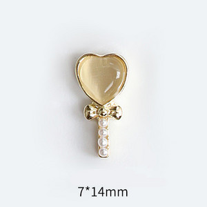 10 tk Cat's Eye Bow küünekunsti amuletid 3D sulamist kullast/hõbedast kassisilmakivist pulgakomm Garland küünekunsti kaunistus DIY küünte tarvikud