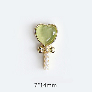 10 tk Cat's Eye Bow küünekunsti amuletid 3D sulamist kullast/hõbedast kassisilmakivist pulgakomm Garland küünekunsti kaunistus DIY küünte tarvikud