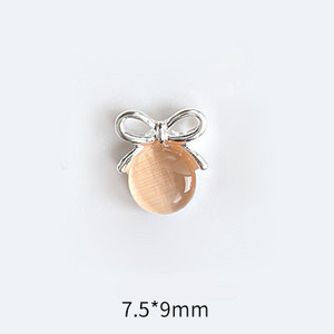 10 tk Cat's Eye Bow küünekunsti amuletid 3D sulamist kullast/hõbedast kassisilmakivist pulgakomm Garland küünekunsti kaunistus DIY küünte tarvikud