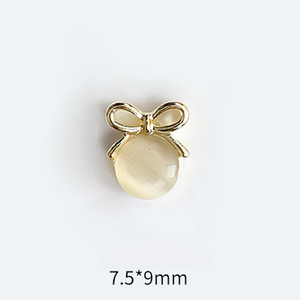 10 tk Cat's Eye Bow küünekunsti amuletid 3D sulamist kullast/hõbedast kassisilmakivist pulgakomm Garland küünekunsti kaunistus DIY küünte tarvikud