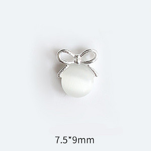 10 tk Cat's Eye Bow küünekunsti amuletid 3D sulamist kullast/hõbedast kassisilmakivist pulgakomm Garland küünekunsti kaunistus DIY küünte tarvikud