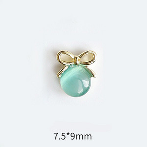 10 tk Cat's Eye Bow küünekunsti amuletid 3D sulamist kullast/hõbedast kassisilmakivist pulgakomm Garland küünekunsti kaunistus DIY küünte tarvikud