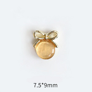 10 tk Cat's Eye Bow küünekunsti amuletid 3D sulamist kullast/hõbedast kassisilmakivist pulgakomm Garland küünekunsti kaunistus DIY küünte tarvikud