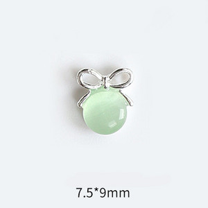 10 tk Cat's Eye Bow küünekunsti amuletid 3D sulamist kullast/hõbedast kassisilmakivist pulgakomm Garland küünekunsti kaunistus DIY küünte tarvikud