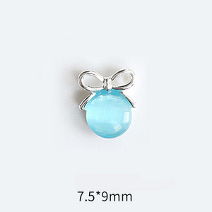 10 tk Cat's Eye Bow küünekunsti amuletid 3D sulamist kullast/hõbedast kassisilmakivist pulgakomm Garland küünekunsti kaunistus DIY küünte tarvikud