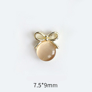 10 tk Cat's Eye Bow küünekunsti amuletid 3D sulamist kullast/hõbedast kassisilmakivist pulgakomm Garland küünekunsti kaunistus DIY küünte tarvikud