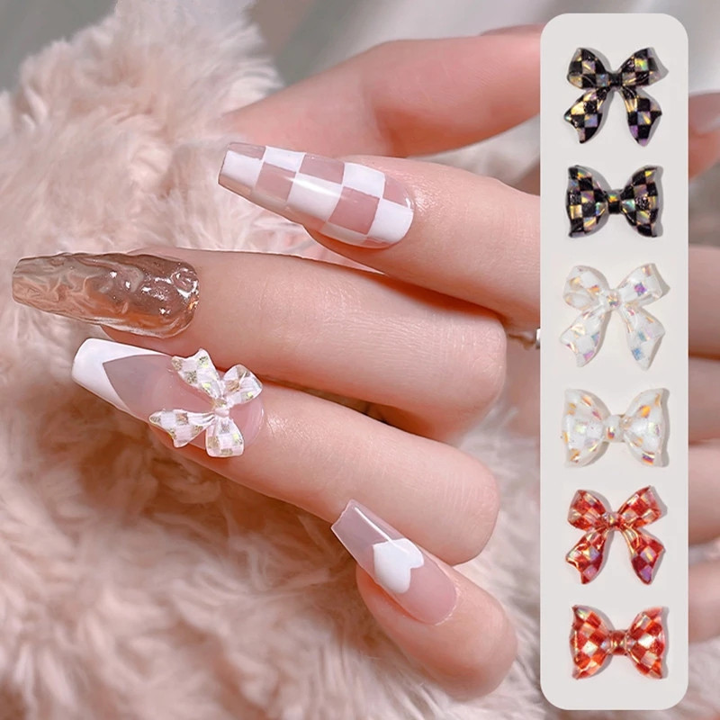 50 komada 3D Aurora šahovnica mašna Nails Art Decoration Smola Vrpca Leptiri Privjesci Nakit Ornament DIY Pribor za manikuru