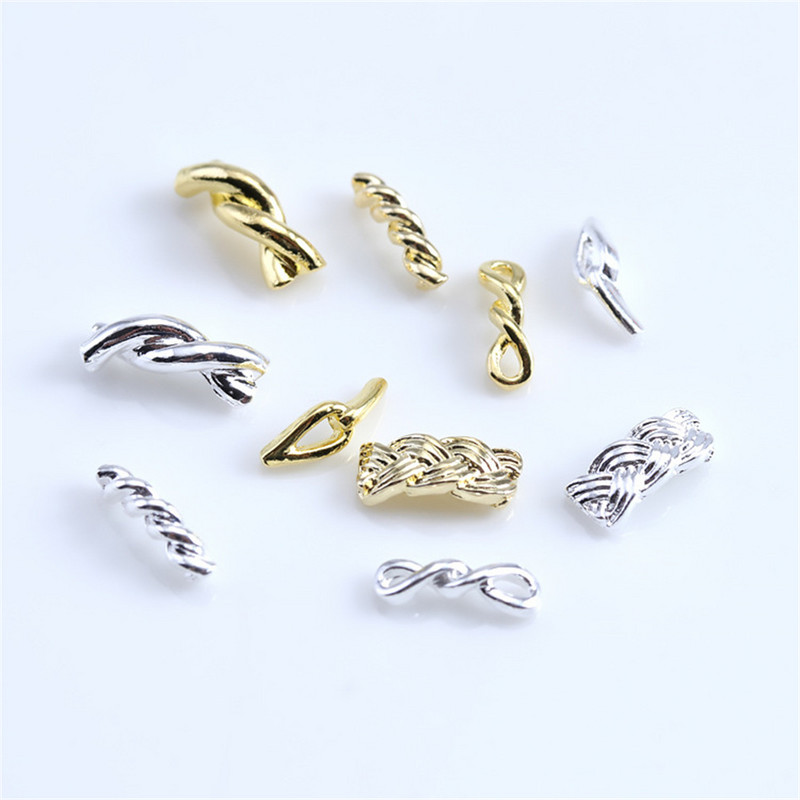 20 komada Japanski 3D Twist Aluminijski Nail Art privjesci Zlatni Srebrni svjetlucavi Legirani klinovi Dodaci Uže Pojas Čvorovi Dijelovi za nokte Dekoracija