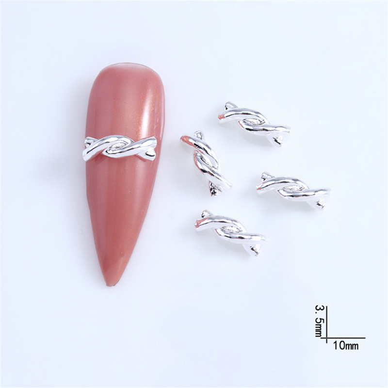 20 komada Japanski 3D Twist Aluminijski Nail Art privjesci Zlatni Srebrni svjetlucavi Legirani klinovi Dodaci Uže Pojas Čvorovi Dijelovi za nokte Dekoracija