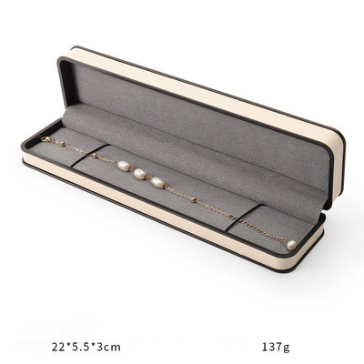 Ehtekarp kõrgekvaliteedilisest PU-nahast moodne ümmargune nurk, must äärega sõrmus kaelakee karbi klapiga ehtepakendite karbid äri jaoks