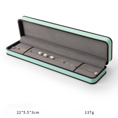 Ehtekarp kõrgekvaliteedilisest PU-nahast moodne ümmargune nurk, must äärega sõrmus kaelakee karbi klapiga ehtepakendite karbid äri jaoks