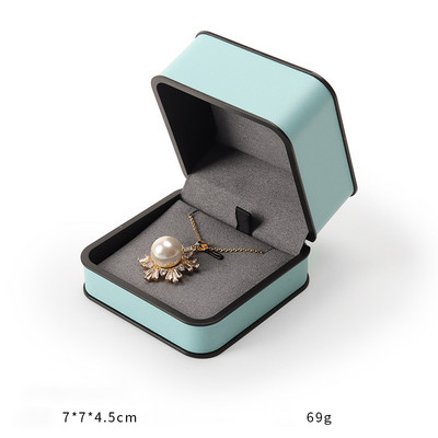 Ehtekarp kõrgekvaliteedilisest PU-nahast moodne ümmargune nurk, must äärega sõrmus kaelakee karbi klapiga ehtepakendite karbid äri jaoks