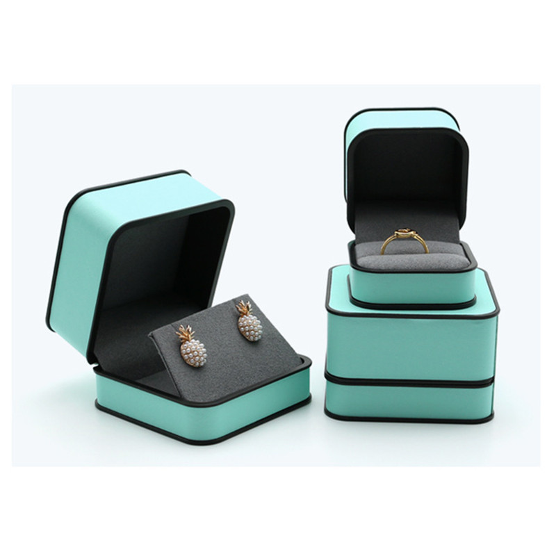 Ehtekarp kõrgekvaliteedilisest PU-nahast moodne ümmargune nurk, must äärega sõrmus kaelakee karbi klapiga ehtepakendite karbid äri jaoks