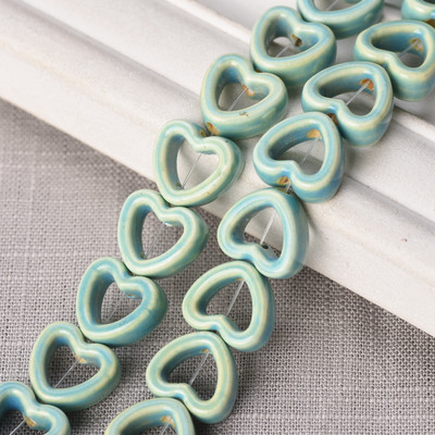 10 tk õõnsa südame kujuga 13,5 mm keraamilised portselanist lahtised helmed ehete tegemiseks isetegemise käsitöö leiud