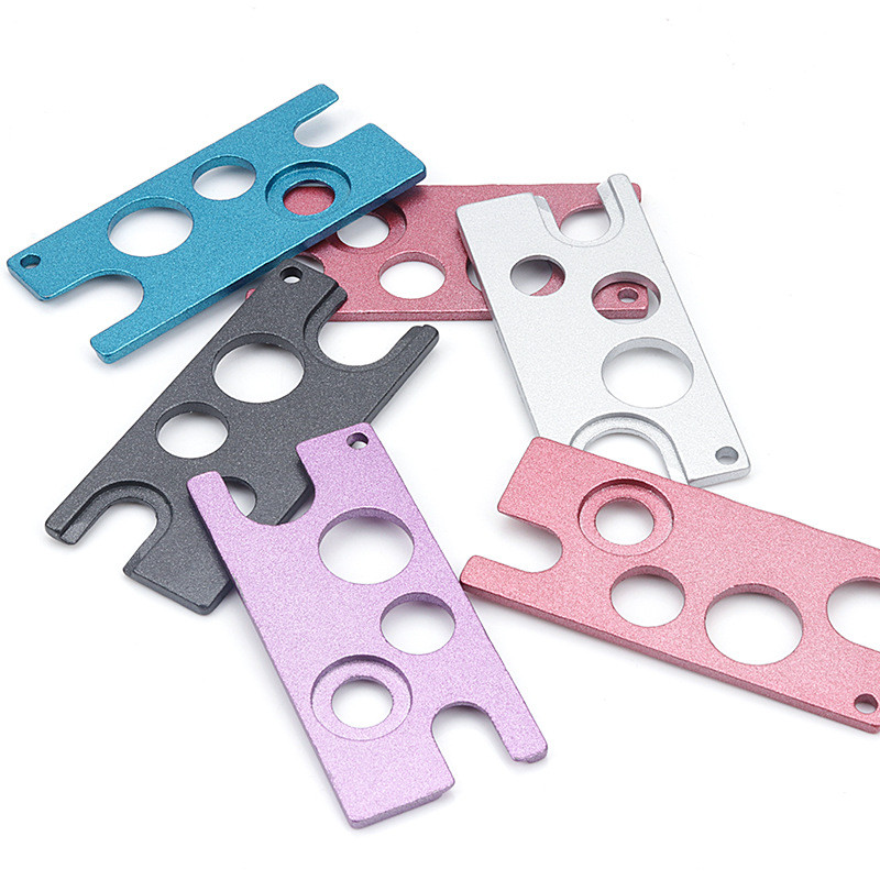 1 τεμ. Ανοιχτήρι από ανοξείδωτο ατσάλι για αντικατάσταση φιάλης κόλλας βλεφαρίδων γενικής χρήσης.