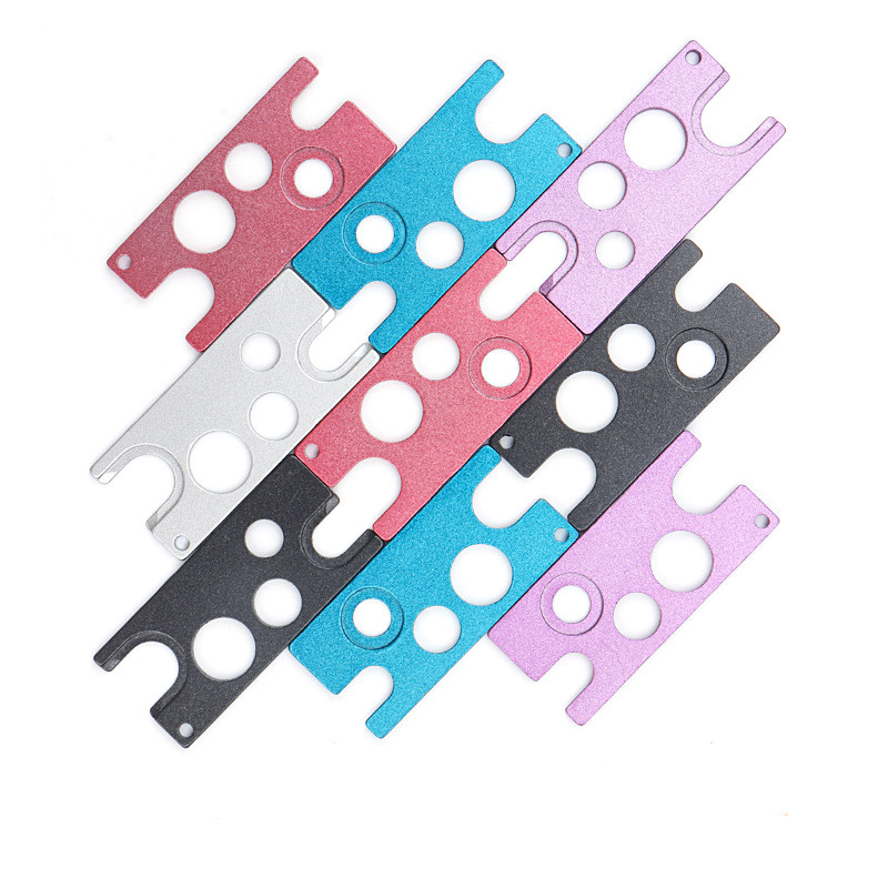 1 τεμ. Ανοιχτήρι από ανοξείδωτο ατσάλι για αντικατάσταση φιάλης κόλλας βλεφαρίδων γενικής χρήσης.