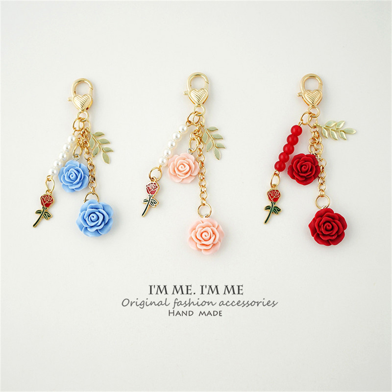 Ins 3D Rose Resin Camellia κρεμαστό κλειδί μαργαριταρένιο κράμα για γυναίκες Βάση κλειδιού αυτοκινήτου Θήκη για ακουστικά Αξεσουάρ τσάντα