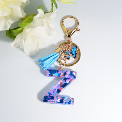 Vaigusinine armastuskirjaga võtmehoidja Käsitsi valmistatud kristallliimi tilk liblikas tutt Aksessuaarid Võtmehoidja Naiste ripats Kaunistused Kingitus