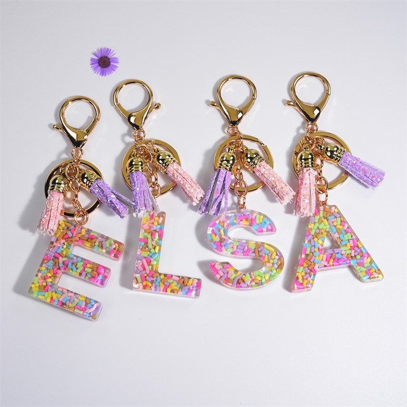 Pehme keraamika kristallist tilgaliimiga võtmehoidja Inglise kirjaga võtmehoidja ripats Värviline tutikott Rippuvad tarvikud Kingitus naistele