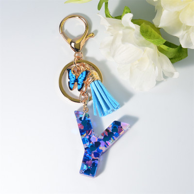 Μπρελόκ με 26 γράμματα μπρελόκ για γυναικεία τσάντα ντεκόρ με παγιέτα με γέμιση 26 γραμμάτων Μόδα μενταγιόν μπλε πεταλούδα με μπρελόκ Δώρα φιλίας