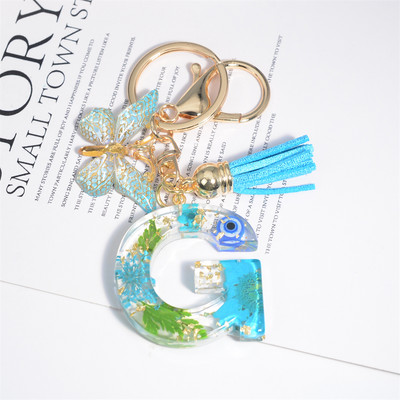 AZ kuivatatud lilledega tähed võtmehoidja Populaarne vaigust tähestik Võtmehoidja Liblikas Tutt Ripats Võtmehoidja Naiste Ehted Aksessuaar Kingitus