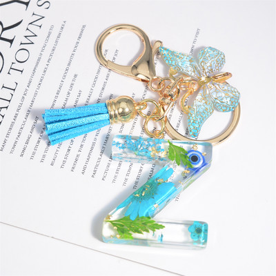 AZ kuivatatud lilledega tähed võtmehoidja Populaarne vaigust tähestik Võtmehoidja Liblikas Tutt Ripats Võtmehoidja Naiste Ehted Aksessuaar Kingitus