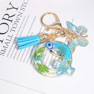 AZ kuivatatud lilledega tähed võtmehoidja Populaarne vaigust tähestik Võtmehoidja Liblikas Tutt Ripats Võtmehoidja Naiste Ehted Aksessuaar Kingitus