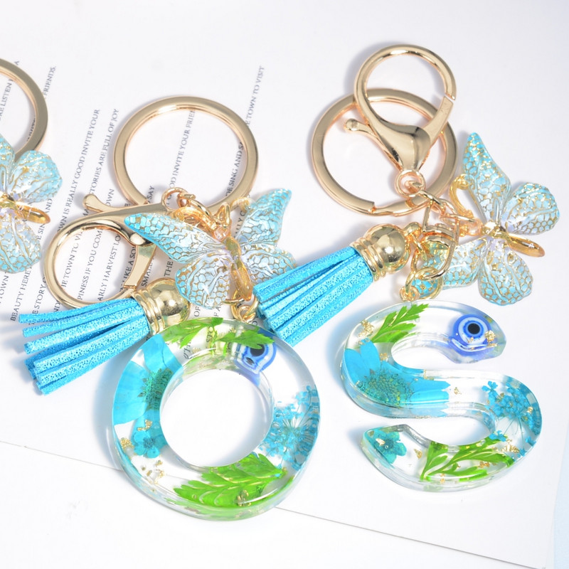 AZ kuivatatud lilledega tähed võtmehoidja Populaarne vaigust tähestik Võtmehoidja Liblikas Tutt Ripats Võtmehoidja Naiste Ehted Aksessuaar Kingitus