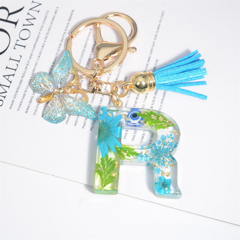 AZ kuivatatud lilledega tähed võtmehoidja Populaarne vaigust tähestik Võtmehoidja Liblikas Tutt Ripats Võtmehoidja Naiste Ehted Aksessuaar Kingitus