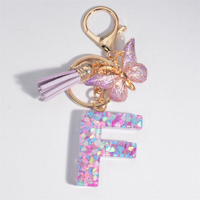 Μπρελόκ με αρχικό γράμμα για γυναίκες Φούντα πεταλούδα μωβ Χαριτωμένο μπρελόκ αυτοκινήτου για γυναικεία κοριτσίστικα πορτοφόλια στολίδια σακίδιο πλάτης