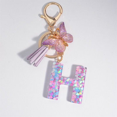 Μπρελόκ με αρχικό γράμμα για γυναίκες Φούντα πεταλούδα μωβ Χαριτωμένο μπρελόκ αυτοκινήτου για γυναικεία κοριτσίστικα πορτοφόλια στολίδια σακίδιο πλάτης
